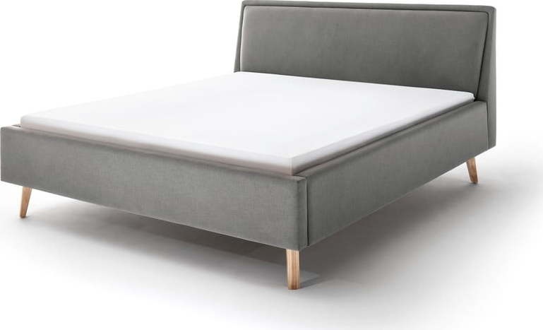 Světle šedá čalouněná dvoulůžková postel 180x200 cm